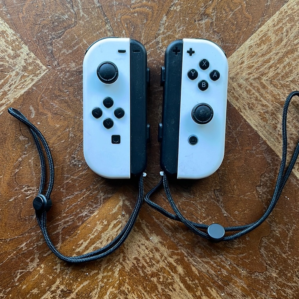Selling these white Nintendo switch controllers. In perfect condition.